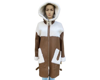 Abrigo de cuero lujoso y elegante para mujer, abrigo de piel de oveja 100%, abrigo cálido de invierno para mujer, chaqueta con capucha