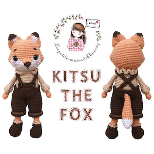 May include: A crocheted fox plush toy named "Kitsu the Fox" wearing brown overalls and brown shoes. The toy is shown from the front and back.