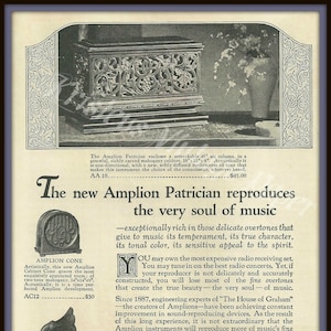May include: A vintage advertisement for the Amplion Patrician, a radio reproducer. The ad features a detailed illustration of the Patrician, a mahogany cabinet with intricate carvings, and a close-up of the Amplion Cone and Dragon models. The text highlights the exceptional sound quality and craftsmanship of the Amplion products.