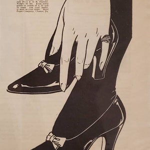 May include: A black and white illustration of a woman wearing a watch and high heels. The woman is holding a box of ScotTissue Towels. The text on the box reads "ScotTissue Towels". The text on the advertisement reads "Your health lies in your own hands. Ordinary precaution prompts you to wash your hands often. Yet, merely washing them clean is not enough. You must also dry them safely clean with an individual, never-before-used towel. For just a few pence a day you can enjoy the comfort, convenience and absolute safety of ScotTissue Towels. Use them in your home, office, garage, automobile, factory."