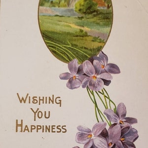 DESEÁNDOLE FELICIDAD Flores Púrpuras En relieve Postal Vintage
