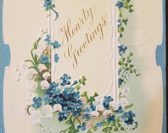 1911 HERZLICHE GRÜßE blaue Blumen geprägt Vintage Postkarte