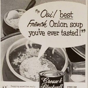 May include: A black and white photo of a can of Crosse & Blackwell French Style Onion Soup. The can is sitting on a table with a pot of soup in the background. The text on the can reads "Crosse & Blackwell French Style Onion Soup Made in U.S.A.". The text on the can also lists other Crosse & Blackwell soup flavors, including Cream of Shrimp, Cock-A-Leekie, Clear Green Turtle, Black Bean with Sherry, Cream of Onion, Cream Vichyssoise, Crab à la Maryland, and Crème Mushroom Bisque.
