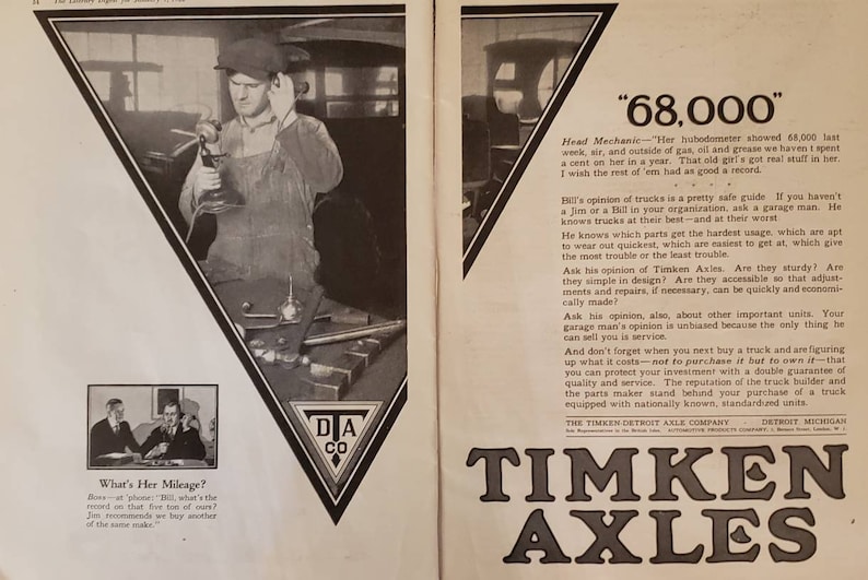 May include: A black and white vintage advertisement for Timken Axles. The ad features a mechanic working on a car and text that reads "68,000" and "Timken Axles".