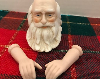 Porcelain santa best sale heads