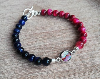 A blue and pink tiger's eye and hematite 8inch bracelet with a heart charm. (size 7-7.5inch)