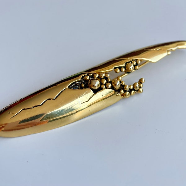 Sidney Carron Paris 1990's- Sculptural brooch with organic and futuristic design in gold-plated tinplate- Length 11 cm- Signed