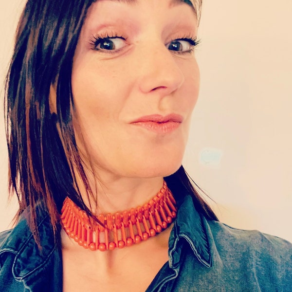 Furla 1960's- Charm necklace choker composed of coral colored resin beads mounted on elastic- Pretty clasp with brass interlacing