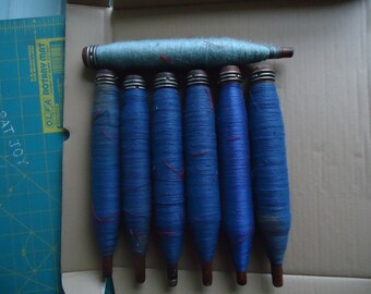 Three Vintage Wooden Bobbins loaded with fine yarn, variable colors