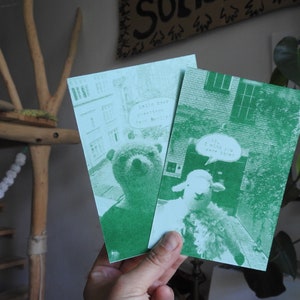 conjunto de dois / cartões postais com impressão riso