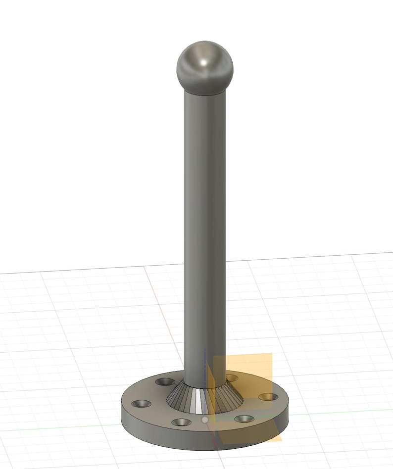 May include: A silver metal rod with a round ball on top and a circular base with six holes. The rod is attached to the base with a cone-shaped piece.