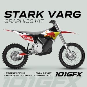 May include: A white and black Stark Varg electric dirt bike with red bull graphics. The bike has a black seat, black wheels, and a black frame. The bike is on a white background. 101GFX is printed on the bottom right corner of the image.