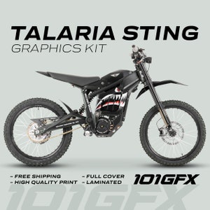 Op de afbeelding: Zwart en groene motorfiets graphics kit met een haaientand ontwerp. De kit bevat een full cover ontwerp en is gelamineerd. De kit is voor een Talaria Sting elektrische motorfiets. De tekst "101GFX" is op de kit gedrukt.