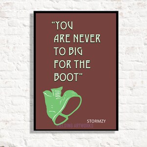 May include: A brown framed print with a white background and green text that reads "YOU ARE NEVER TO BIG FOR THE BOOT". The text is in a bold, sans-serif font. Below the text is a green illustration of a boot. The print is signed "Stormzy" and "Fielding Artworks" in white text.