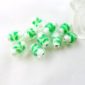 original oval glass bead, foliage printed glass bead, pearl inclusion bead, tube bead, opaque white transparent glass, x 4