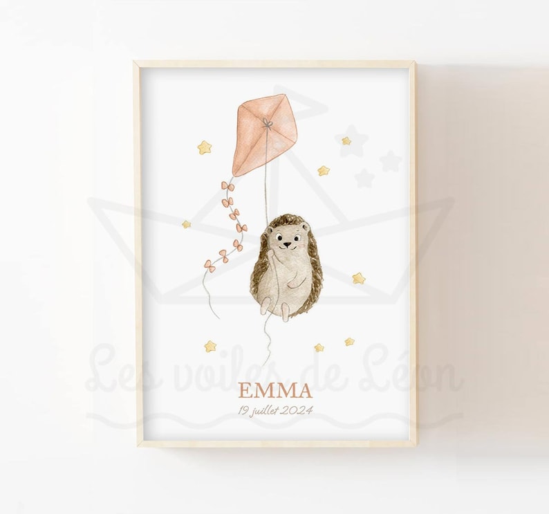 May include: A watercolour illustration of a hedgehog holding onto a pink kite with a string of bows. The hedgehog is flying through the air with yellow stars scattered around it. The text "EMMA 19 Juillet 2024" is at the bottom of the image.