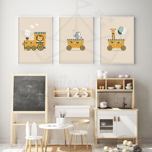 May include: Three framed prints with a yellow background and white frames. Each print features a different animal riding in a yellow wagon. The first print shows a lion in a train, the second print shows an elephant holding a ball, and the third print shows a giraffe holding balloons.
