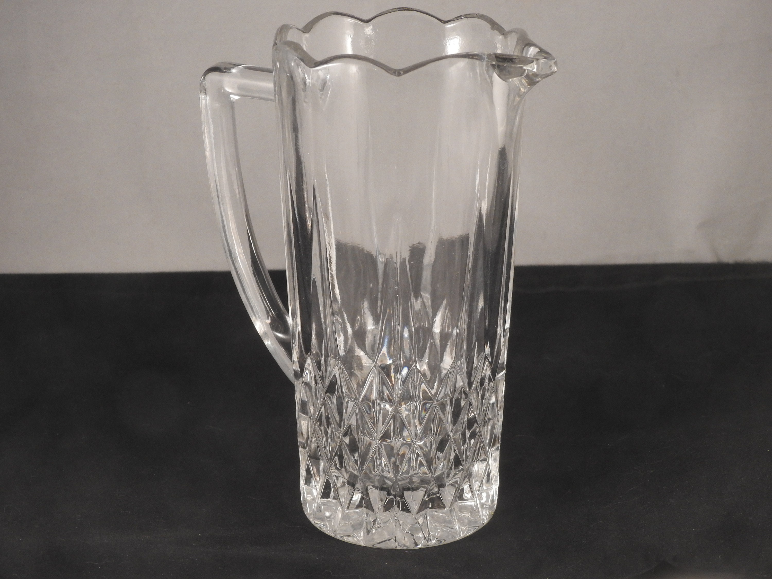 Small Cut Glass Pitcher With Silvertone Spout and Handle. No