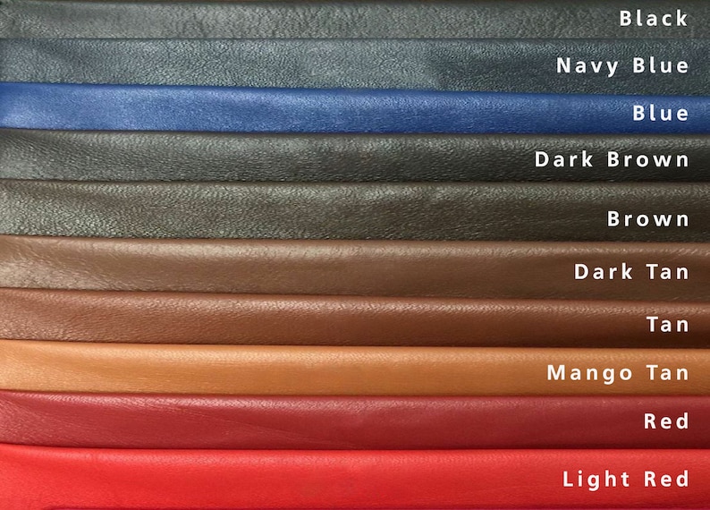 May include: A color palette of leather swatches in various shades, including black, navy blue, blue, dark brown, brown, dark tan, tan, mango tan, red, and light red. Each swatch is labeled with its corresponding color name.