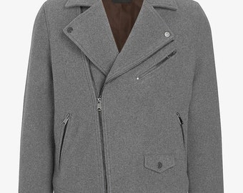 May include: A grey zipped biker jacket with a brown lining and multiple pockets.