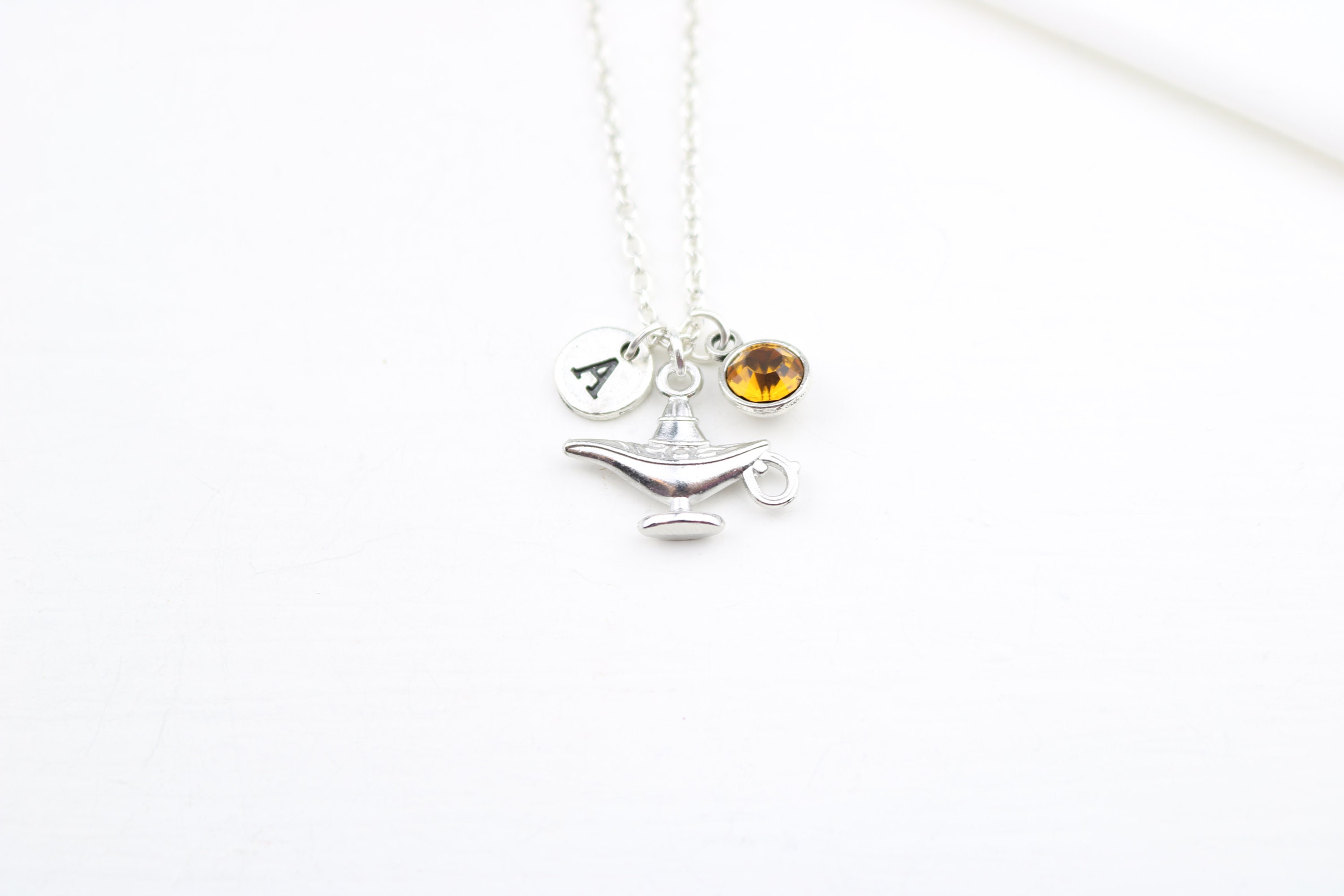 Gold genie lamp best sale necklace