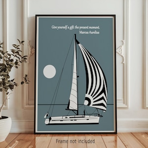May include: Framed print of a sailboat illustration with a black and white striped sail against a teal background. Includes a white moon and the quote "Give yourself a gift: the present moment. Marcus Aurelius." The words "Frame not included" are at the bottom.