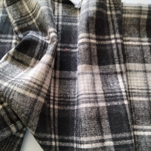 Black and gray tartan style fleece fabric image 2