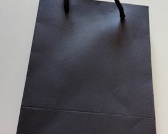 petit sac cadeau de luxe papier cartonné noir