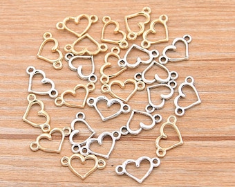 set of 5 conector charms in the shape of openwork hearts in steel, gold or silver colored