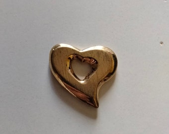 vintage silver or gold steel heart pendant from the 2000s