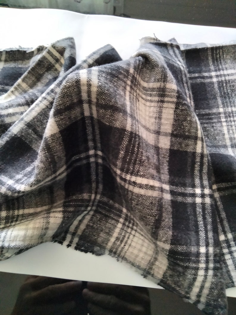 Black and gray tartan style fleece fabric image 1