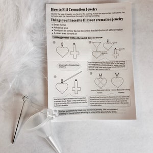 May include: Instructions on how to fill cremation jewelry with a threaded bale or screw. The instructions include images of the jewelry, a funnel, and a toothpick. The text reads "How to Fill Cremation Jewelry" and "Things you'll need to fill your cremation jewelry".