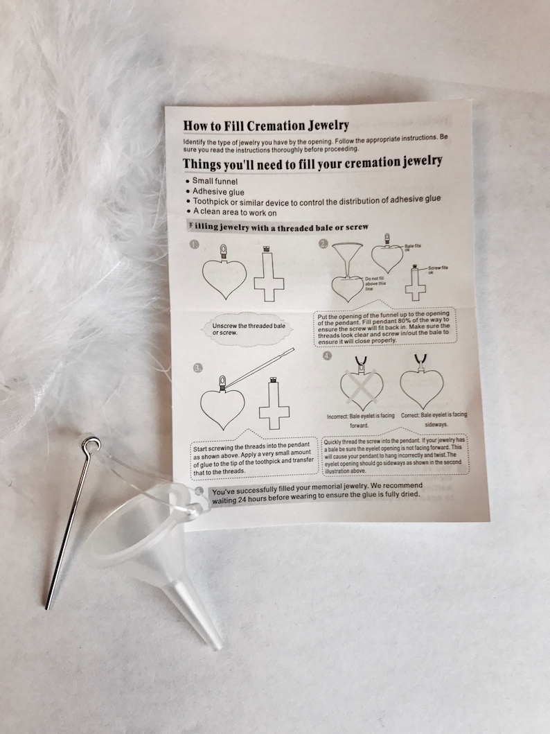 May include: Instructions on how to fill cremation jewelry with a threaded bale or screw. The instructions include images of the jewelry, a funnel, and a toothpick. The text reads "How to Fill Cremation Jewelry" and "Things you'll need to fill your cremation jewelry".