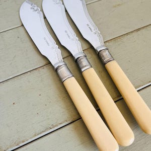 Lovely Vintage set of 3 J.B Silver Plated Fish Knives