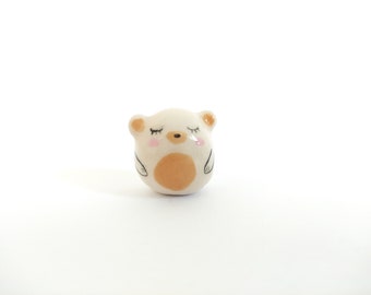 Small lucky bear charm in ceramic