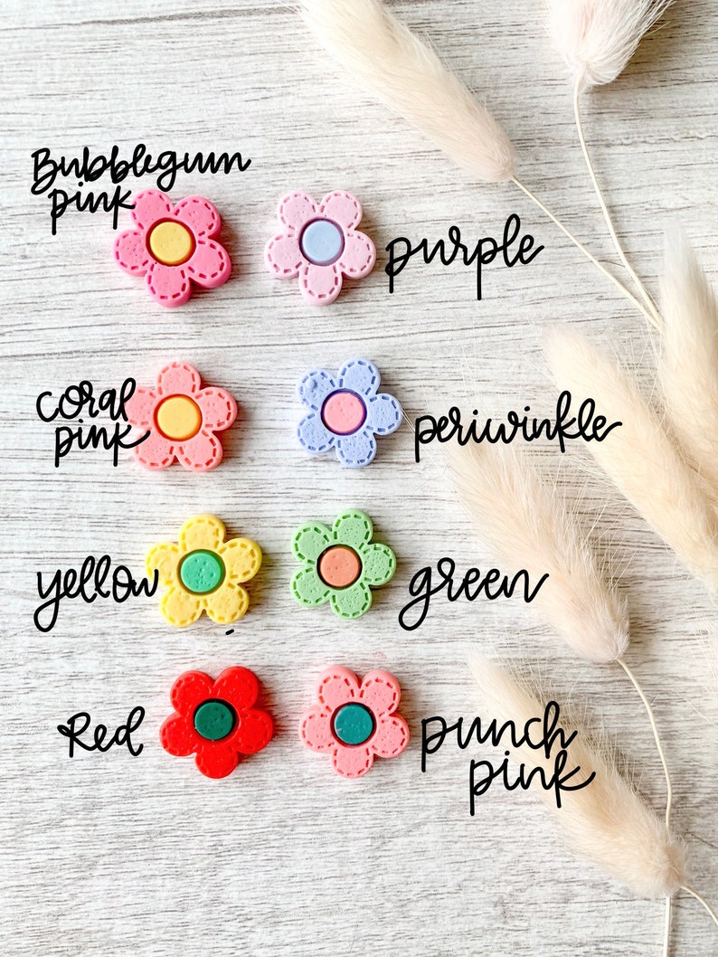 Flower needle minder magnets for sewing and embroidery in various color options.