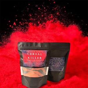 May include: Two black pouches of bath bomb powder against a red and black background. The front pouch has a label that reads "Twisted Jade's Cereal Killer Bath Bomb Powder". The second pouch has instructions.
