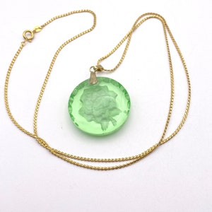 Round crystal pendant engraved with a rose in 5 color models from the Upcycled Jewelry Collection