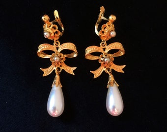 Dangling vermeil earrings, 2 models