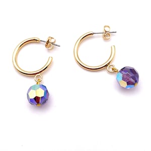 Hoop earrings with purple faceted pearl pendant from the Upcycled jewelry collection