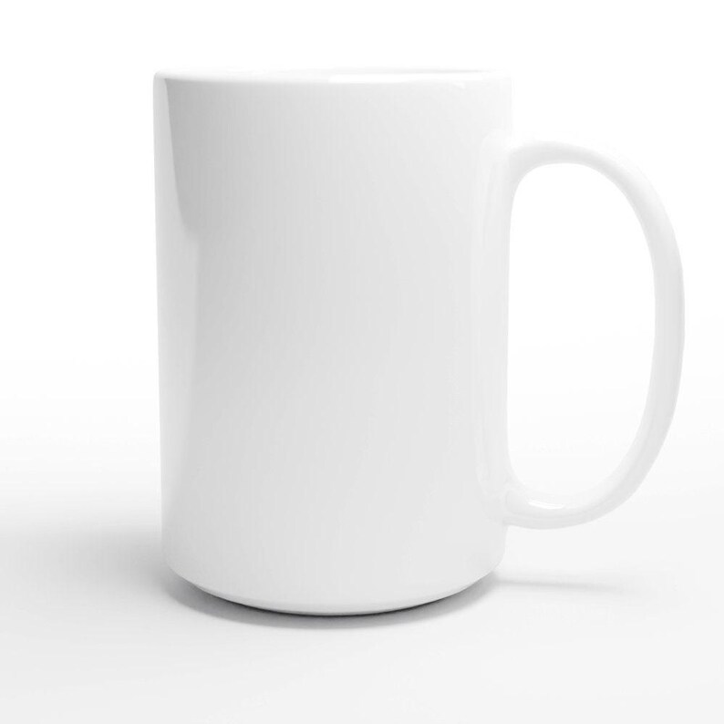 A plain white ceramic mug with a simple handle.