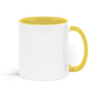 A white ceramic mug with a yellow interior and handle.