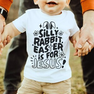 Retro Dummes Kaninchen Ostern ist für Jesus Kinder-Shirt SVG, Er ist auferstanden Wavy SVG, religiöse Mädchen Ostern Sublimation, Gott sagt, ich bin Kinder Png