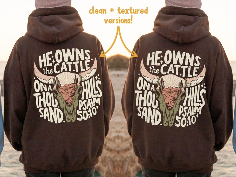 May include: A brown hoodie with a graphic on the back that reads "He Owns the Cattle On a Thousand Hills Psalm 50:10". The graphic features a bull skull, desert landscape, and cactus.