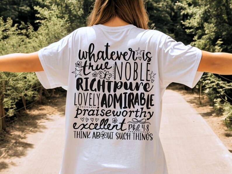 May include: White t-shirt with black text on the back. The text includes the words "whatever is true, noble, right, pure, lovely, admirable, praiseworthy, excellent" and "Think about such things" with a reference to Philippians 4:8.