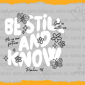 May include: A digital design with the words "BE STILL AND KNOW" in large white letters, accompanied by butterfly and flower illustrations. The text "God is with us" and "He is our fortress" are also included. The design is set against a gray background with an orange border.
