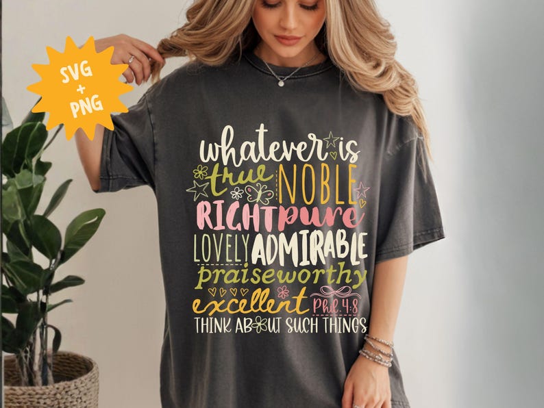 May include: Dark gray t-shirt with the words "whatever is true, noble, right, pure, lovely, admirable, praiseworthy, excellent" in a colorful design. The text also includes "Philippians 4:8" and "Think about such things."