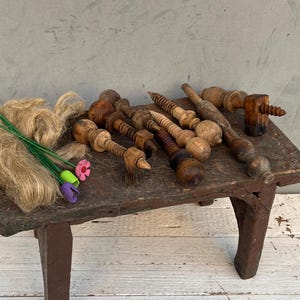 Some details of an old spinning wheel, Wooden carving, Wooden spinning wheel, Primitive rustic tool, Village house,Rustic decor, Folk art