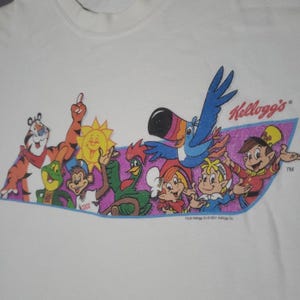Rzadka koszulka Kelloggs Mascot z lat 90. z nadrukiem płatków zbożowych, męska, rozmiar 2XL