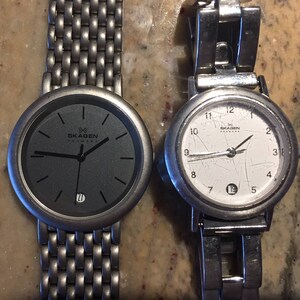 Skagen  denmark (2)ladies watches -16sssw/ 73LTXboth w/date running both for
